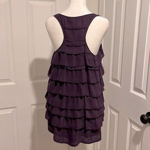 Hannah G. Razor back tank top. Beautiful shade of purple. Side zipper. Size M.